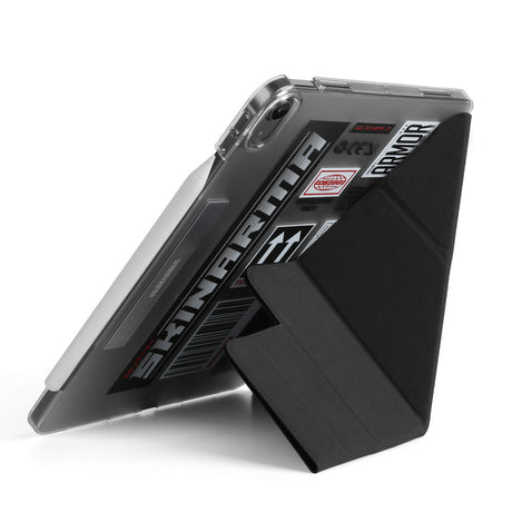 Apple iPad Pro 11 2025 M5 Kılıf SkinArma Sticker Tasarımlı Kalemlikli Arkası Şeffaf Standlı Magnetik Taito Kılıf